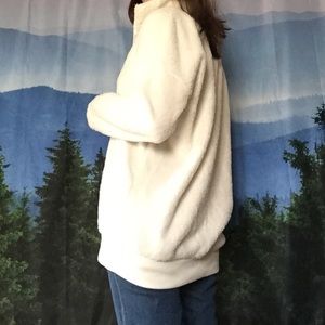 Fluffy white sweater